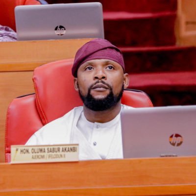 Hon. Sabur Akanbi Oluwa at his seat in the Assembly chamber